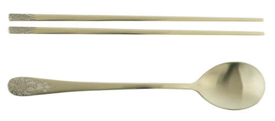 Chinese chopsticks and spoon on isolated background.