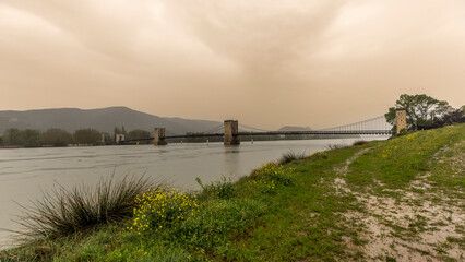 Robinet bridge on the Rhone one morning with a shower of Saharan sand