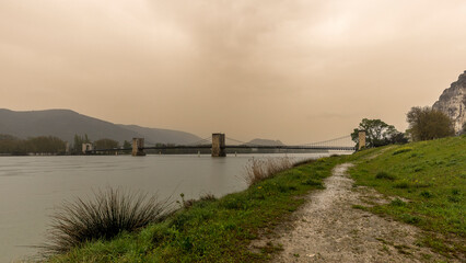 Robinet bridge on the Rhone one morning with a shower of Saharan sand