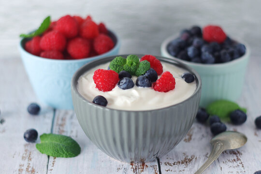 A bowl with Greek yogurt with berries	