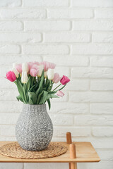 Bouquet of pink and white tulips in vase - 771491345