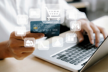 Elegant customer hold credit card with hologram interface choose online platform. Smart consumer...
