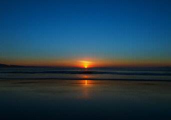 Sun's reflection on waves.