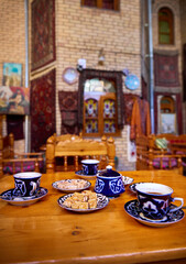 Traditional Uzbek tea with  sweets in coffee house at Bukhara - 771504505