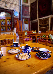 Traditional Uzbek tea with  sweets in coffee house at Bukhara