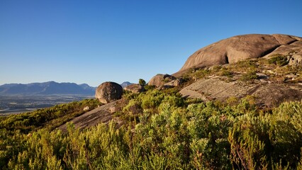 Closeup of Paarl Rocks and Paarl at the mountains of Paarl under the blue sky in South Africa