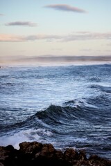 Tranquil waves against the backdrop of a sky. Hermanus, Western Cape.