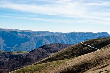 a long winding road that is on top of a mountain