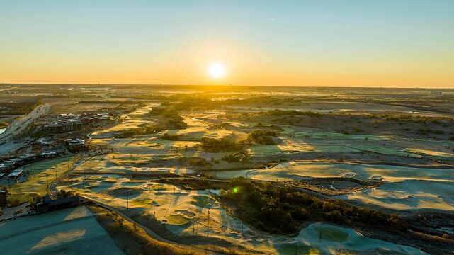 Aerial view of PGA Frisco Gold Course in Texas at sunset