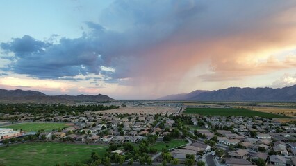 Scenic aerial view of the skyline of Laveen near mountains at sunset