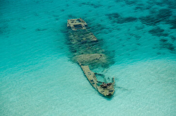 Sunken ship at the reef in Kuna Yala. San Blas archipelago, Caribbean, Panama, Central America.