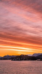 Stunning image of the natural landscape at sunset, featuring the vast expanse of the ocean