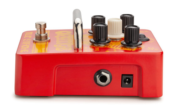 orange two stroke eq guitar pedal path isolated on white