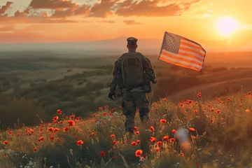 Fotobehang Soldier with an American flag in a poppy field at sunset. Memorial day. © Larisa