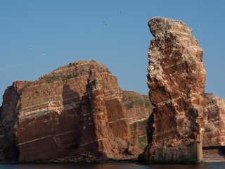 Tranquil body of water surrounded by dramatic rock formations