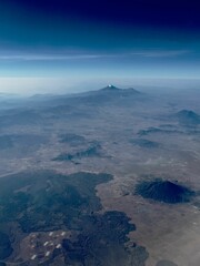 Tepeyahualco, Puebla, Mexico view from airplane of the volcanoes