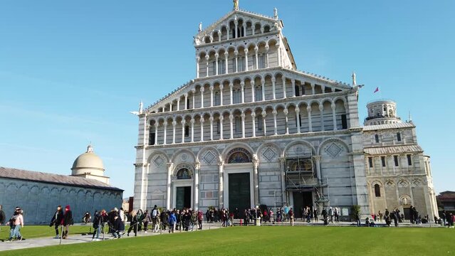 The frontal facade of the Cathedral of Pisa at the Piazza del Duomo