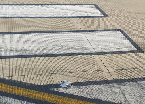 Lines on a airport runway with grooved pavement