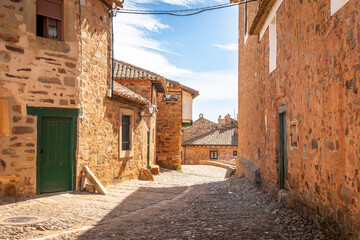 street with traditional architecture in Castrillo de los Polvazares, municipality of Astorga,...