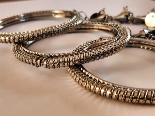 Picture of beautiful jewelry Bracelet made of metal shot during daylight