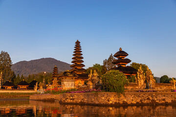 Pura Ulun Danu Bratan at sunrise, famous temple on the lake, Bedugul, Bali, Indonesia. - obrazy, fototapety, plakaty