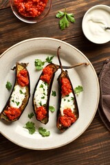 Roasted aubergine with yogurt and tomato sauce dressing