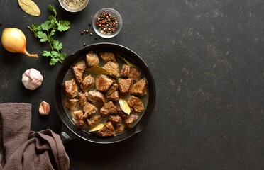 Braised beef in cast iron skillet