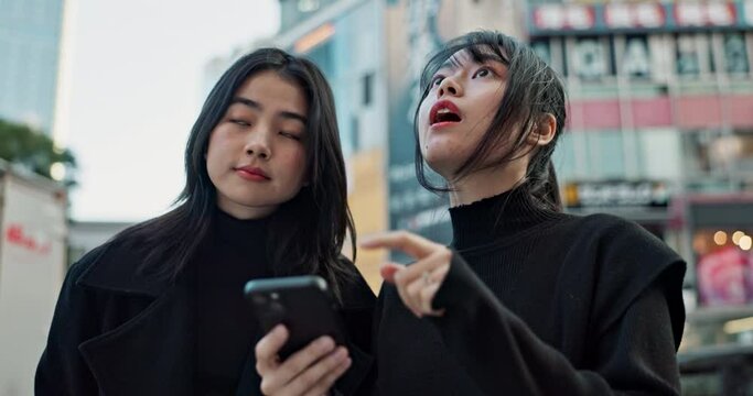 Japanese friends, outdoor and travel with a smartphone, vacation and conversation with digital app, holiday and break. Commute, women and girls with a cellphone, digital app and talking with internet