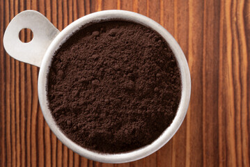 Dark Cocoa Powder in a Vintage Measuring Cup - 771549146