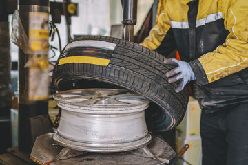 Professional Tire Change at Auto Service Workshop - 771578149
