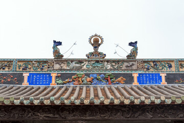 Intricate Dragon Sculpture on Asian Temple Roof