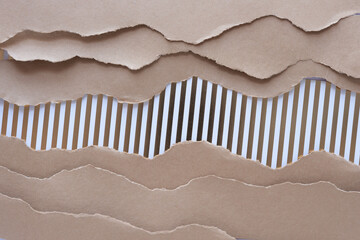 layered paper stripes with torn edges posing as frame borders to a scrapbooking paper with stripes