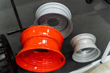 Three stacked color wheels with Automotive tire and Rim