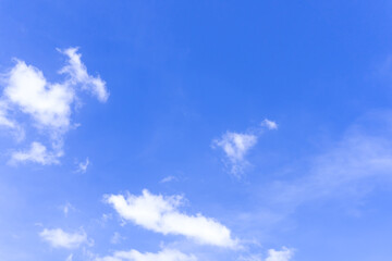Obraz premium Beautiful blue sky with strange shape of clouds in the morning or evening used as natural background texture in decorative art work