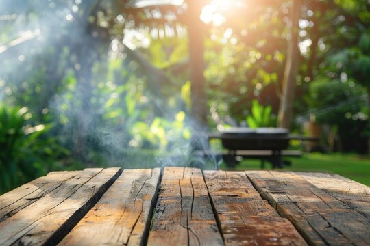 BBq grill in the back yard background with empty wooden table
