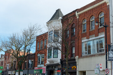 Naklejka premium buildings lining the south side of Dundas Street West in Toronto's Junction neighborhood