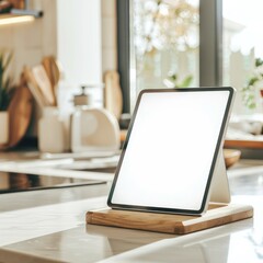 Blank white screen tablet propped on a kitchen counter recipe app mockup concept - obrazy, fototapety, plakaty