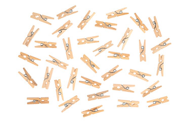 Small household сlothes pins isolated on white background. wooden clothespins - obrazy, fototapety, plakaty