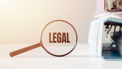 legal /Magnifying glass on the Legal on office table