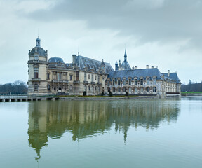 Chateau de Chantilly (France). The Petit Chateau built in 1560 (on right, architect  Jean Bullant) and Grand Chateau rebuilt in 1870 s (on left, architect Honore Daumet).