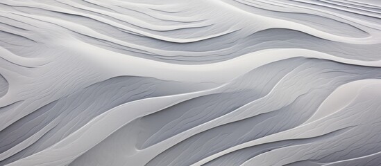 An artistic closeup of a freezing grey sand dune with liquid waves in electric blue, creating a mesmerizing pattern on the slope. Reminiscent of a Jersey shore artwork on linens