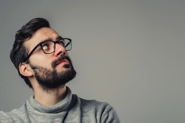 man thinking about an idea Isolated on dark grey white background
