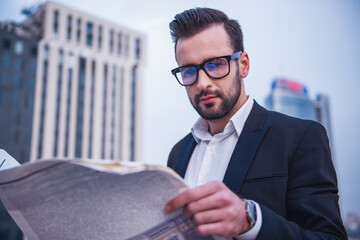 Handsome businessman outdoors