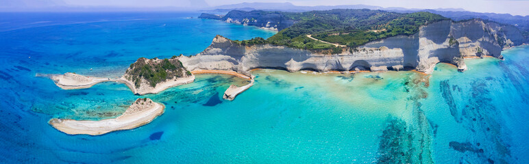 Ionian islands of Greece Corfu. Panoramic aerial view of stunning Cape Drastis - natural beuty landscape with white rocks and turquoise waters, north of the island - 771627967