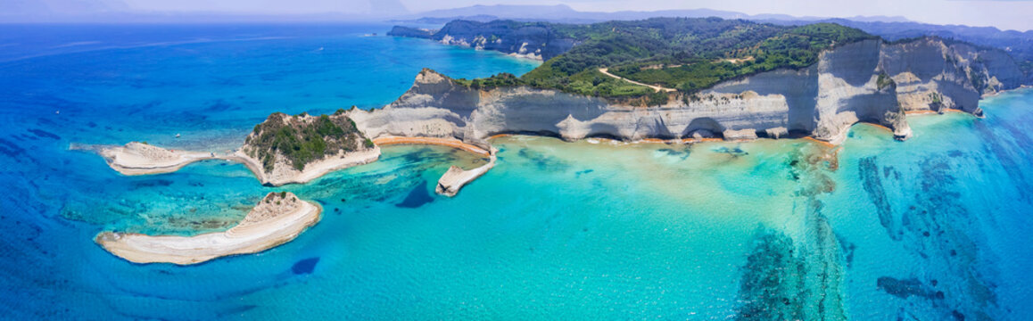 Ionian islands of Greece Corfu. Panoramic aerial view of stunning Cape Drastis - natural beuty landscape with white rocks and turquoise waters, north of the island