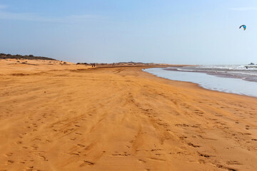 Fototapeta na wymiar View of the Essaouira sand beach on the Atlantic coast. Morocco.