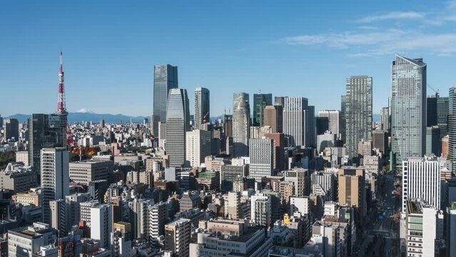 Timelapse view of skyscrapers in the Minato district of Tokyo, Japan, zoom out. 