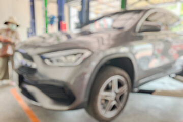 car service centre auto repair workshop blurred background