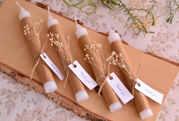 Wedding favors white candles decoration brown beige craft paper with jute ribbon dry flowers...