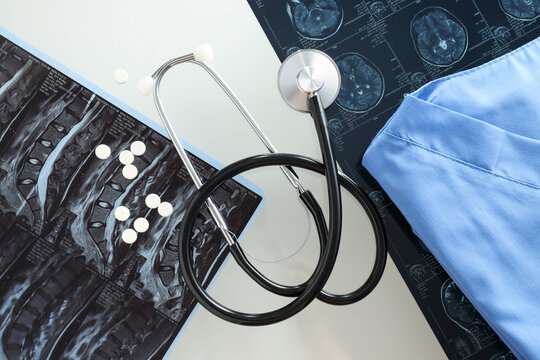 Images of MRI or magnetic resonance imaging with stethoscope and pills.